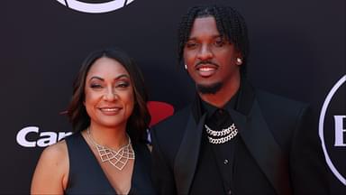 Washington Commanders quarterback Jayden Daniels and his mother Regina Jackson arrive on the red carpet before the 2024 ESPYS at Dolby Theatre.