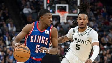 Sacramento Kings guard De'Aaron Fox (5) dribbles the basketball against San Antonio Spurs guard Stephon Castle (5) during the second quarter at Golden 1 Center