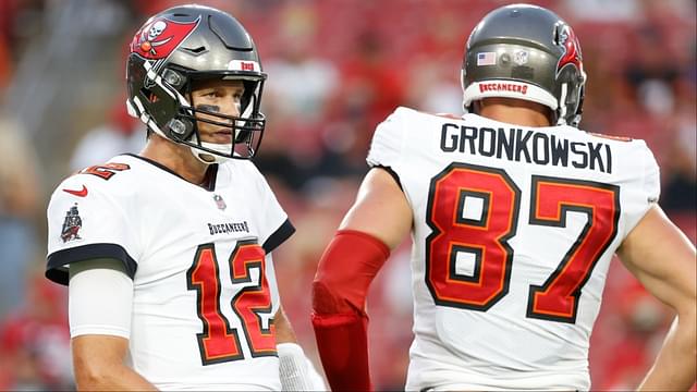 Tampa Bay Buccaneers quarterback Tom Brady (12) and tight end Rob Gronkowski (87) looks on against the Cincinnati Bengals during the first quarter at Raymond James Stadium.