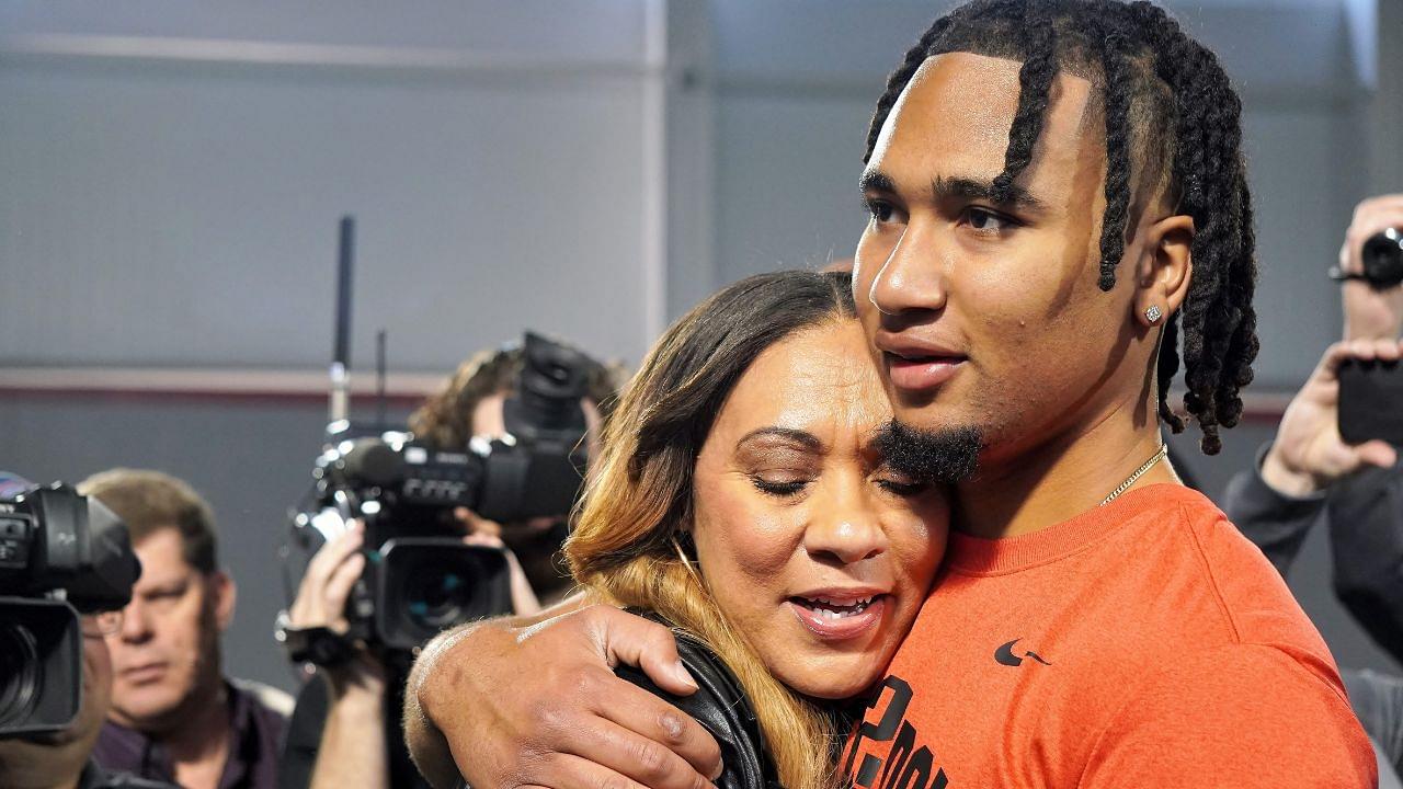 Ohio State quarterback C.J. Stroud hugs his mother, Kim, after his workout on the Buckeyes' pro day. CJ Stroud