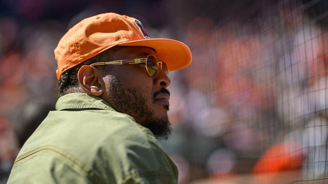 Former professional basketball player Carmelo Anthony attends a game between the Baltimore Orioles and the Tampa Bay Rays at Oriole Park at Camden Yards.