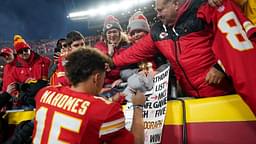 Kansas City Chiefs quarterback Patrick Mahomes (15) signs autographs for fans after the win over the Las Vegas Raiders at GEHA Field at Arrowhead Stadium.