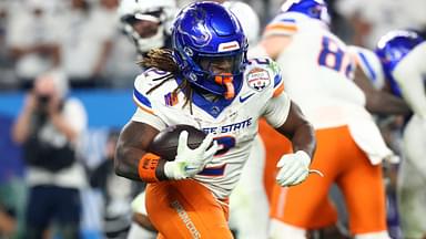 Dec 31, 2024; Glendale, AZ, USA; Boise State Broncos running back Ashton Jeanty (2) rushes the ball against the Penn State Nittany Lions during the second half in the Fiesta Bowl at State Farm Stadium.