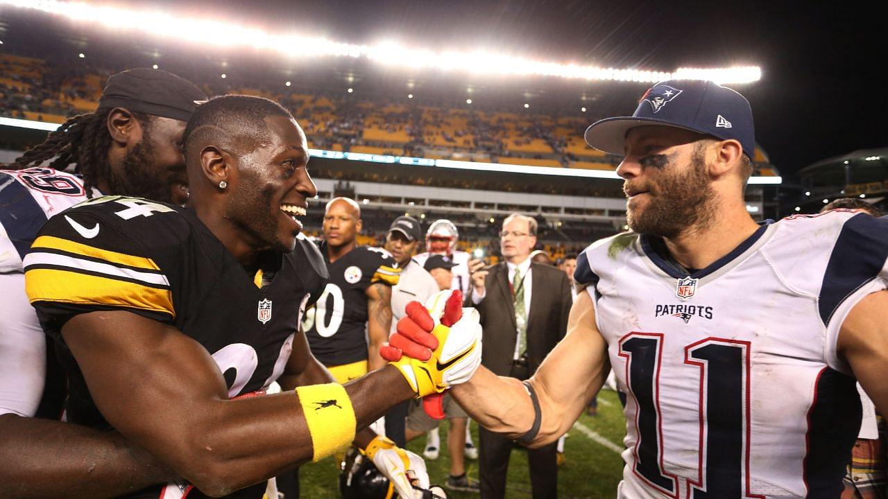 Pittsburgh Steelers wide receiver Antonio Brown (84) and New England Patriots wide receiver Julian Edelman (11) shake hands after their game at Heinz Field. New England won 27-16.