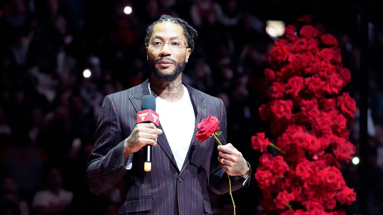 Chicago Bulls and New York Knicks former player Derrick Rose speaks as he is honored at halftime of a game between the Chicago Bulls and the New York Knicks at United Center