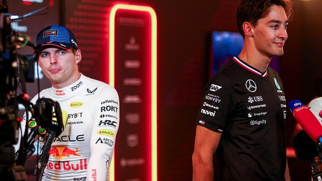 Max Verstappen of the Netherlands and Oracle Red Bull Racing and George Russell of Great Britain