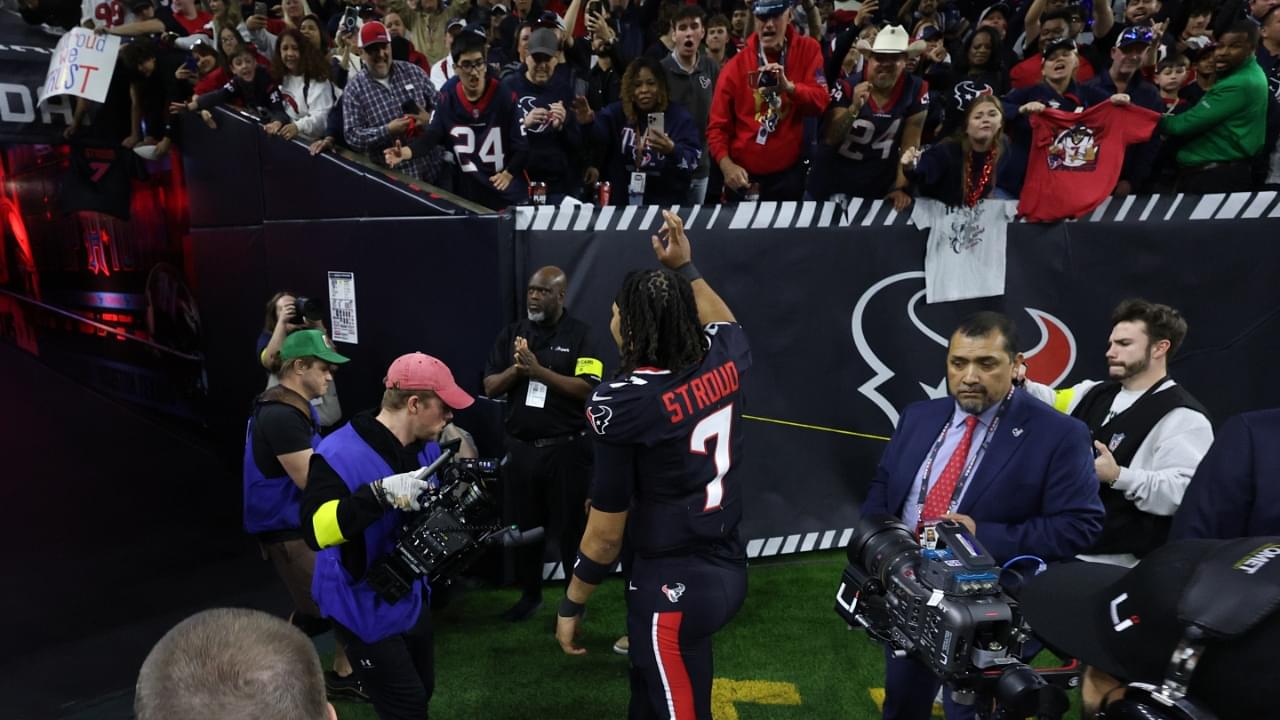 Jan 11, 2025; Houston, Texas, USA; Houston Texans quarterback C.J. Stroud (7) walks off the field after the win against the Los Angeles Chargers in an AFC wild card game at NRG Stadium.