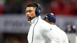 Notre Dame Fighting Irish head coach Marcus Freeman looks on against the Ohio State Buckeyes during the first half the CFP National Championship college football game at Mercedes-Benz Stadium.