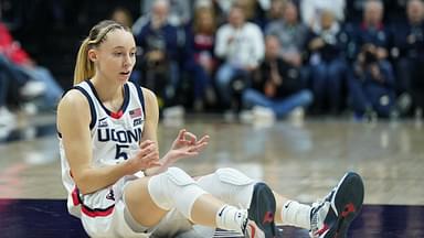 UConn Huskies guard Paige Bueckers (5) reacts after her three point basket and being fouled by the Villanova Wildcats in the first half at Harry A. Gampel Pavilion