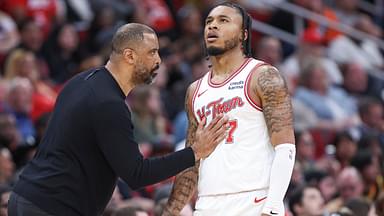 Houston Rockets head coach Ime Udoka talks with forward Cam Whitmore (7) during the third quarter against the Phoenix Suns at Toyota Center.