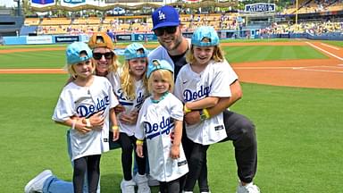 USA; Los Angeles Rams quarterback Matthew Stafford (9) with his wife Kelly with their 4 daughters on the field prior to the game between the Los Angeles Dodgers and the Atlanta Braves at Dodger Stadium. Stafford was at the game on Rams day.