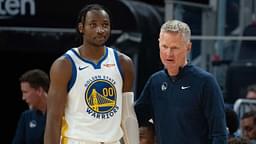 Golden State Warriors head coach Steve Kerr (right) talks to forward Jonathan Kuminga (00) during the third quarter against the San Antonio Spurs at Chase Center.