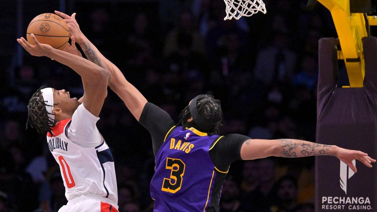 Los Angeles Lakers forward Anthony Davis (3) blocks a shot by Washington Wizards guard Bilal Coulibaly (0) at Crypto.com Arena.