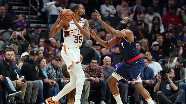 LA Clippers guard James Harden (1) guards Phoenix Suns forward Kevin Durant (35) during the second half at Footprint Center.