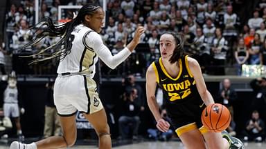 Purdue Boilermakers guard Jayla Smith (3) defends Iowa Hawkeyes guard Caitlin Clark (22) during the NCAA women’s basketball game