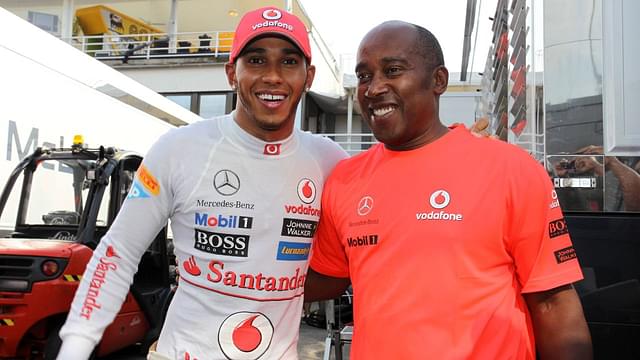 Lewis Hamilton (GBR) McLaren Mercedes MP4-27 race winner with his father Anthony Hamilton (GBR) Hungarian Grand Prix, Hungaroring