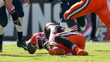 Cleveland Browns quarterback Deshaun Watson (4) goes down with a non-contact injury to his lower leg in the second quarter of the NFL Week 7 game between the Cleveland Browns and the Cincinnati Bengals at Huntington Bank Field in downtown Cleveland.