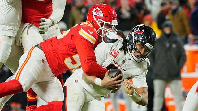 Jan 18, 2025; Kansas City, Missouri, USA; Houston Texans quarterback C.J. Stroud (7) is sacked by Kansas City Chiefs defensive end George Karlaftis (56) during the fourth quarter of a 2025 AFC divisional round game at GEHA Field at Arrowhead Stadium.