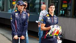 PEREZ Sergio (mex), Red Bull Racing RB19, with his performance coach, Jo Canales, in the paddock during the 2023 Formula 1 Heineken Dutch Grand Prix, 13th round of the 2023 Formula One World Championship