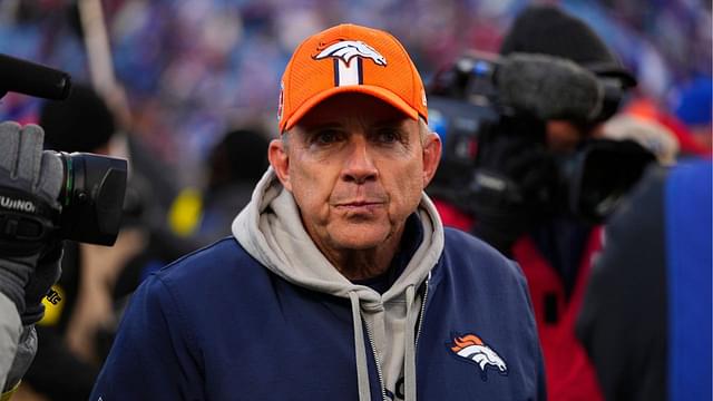 Denver Broncos head coach Sean Payton walks off the field after losing to the Buffalo Bills in an AFC wild card game at Highmark Stadium.