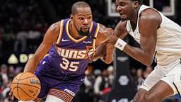 Phoenix Suns forward Kevin Durant (35) is defended by Atlanta Hawks center Clint Capela (15) during the second half at State Farm Arena.