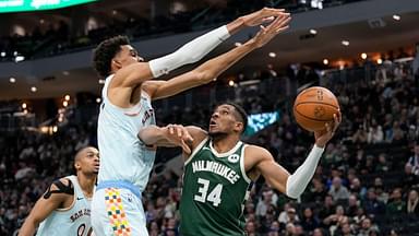 Milwaukee Bucks forward Giannis Antetokounmpo (34) looks to shoot under pressure from San Antonio Spurs forward Victor Wembanyama (1) during the fourth quarter at Fiserv Forum