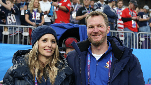 Former NASCAR driver Dale Earnhardt Jr. and wife Amy in attendance before Super Bowl LII between the Philadelphia Eagles and the New England Patriots at U.S. Bank Stadium.