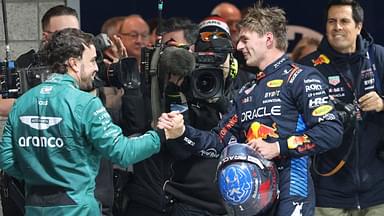 After winning his fourth F1 world title, Max Verstappen (1) Oracle Red Bull Racing shakes hands with Fernando Alonso in the pits at the conclusion of the F1 Heineken Silver Las Vegas Grand Prix