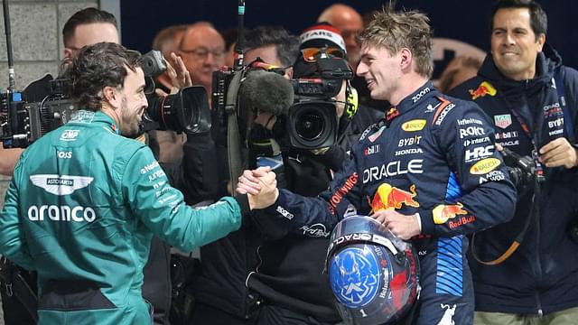 After winning his fourth F1 world title, Max Verstappen (1) Oracle Red Bull Racing shakes hands with Fernando Alonso in the pits at the conclusion of the F1 Heineken Silver Las Vegas Grand Prix