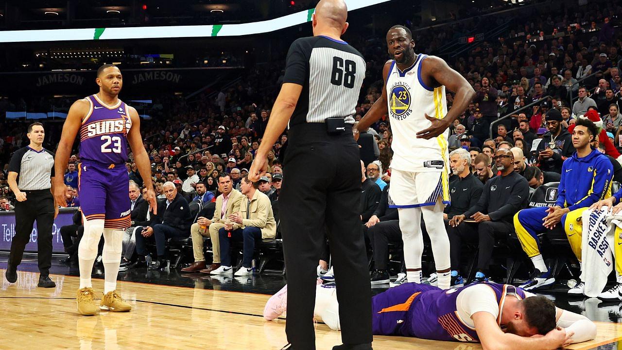 Golden State Warriors forward Draymond Green (23) reacts after being called for a foul on Phoenix Suns center Jusuf Nurkic (20) during the third quarter at Footprint Center.