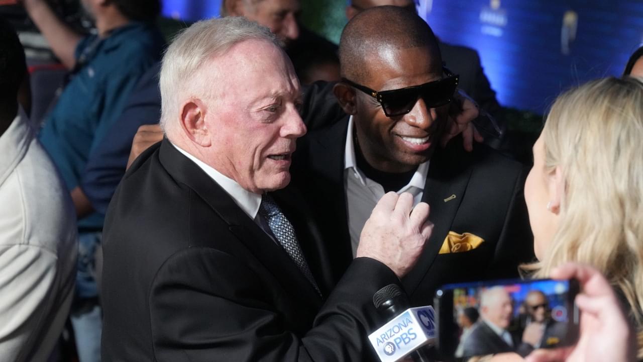 Cowboys owner Jerry Jones and former NFL cornerback Deion Sanders embrace as they walk the red carpet before the NFL Honors awards special at the Phoenix Convention Center on Thursday, Feb. 9, 2023