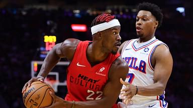 Miami Heat forward Jimmy Butler (22) protects the basketball from Philadelphia 76ers guard Kyle Lowry (7) during the second quarter at Kaseya Center