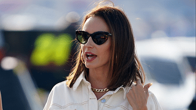 Sep 5, 2021; Darlington, South Carolina, USA; Samantha Busch walks down pit road prior to the Cook Out Southern 500 at Darlington Raceway. Mandatory Credit: Jasen Vinlove-Imagn Images