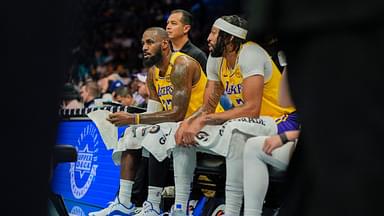 Los Angeles Lakers forward Anthony Davis (3) and Los Angeles Lakers forward LeBron James (23) during a timeout against the Charlotte Hornets during the first quarter at the Spectrum Center