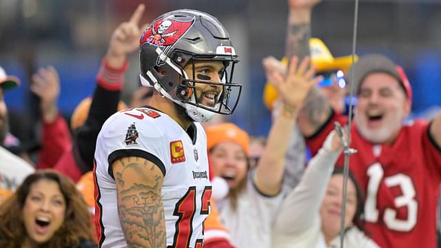 Fans celebrate after a touchdown by Tampa Bay Buccaneers wide receiver Mike Evans (13) in the second half against the Los Angeles Chargers at SoFi Stadium.