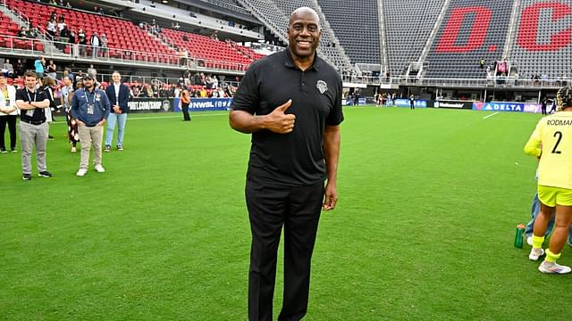 Washington Commanders owner Magic Johnson poses for a photo after the game between the Washington Spirit and Portland Thorns FC at Audi Field.