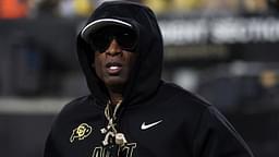 Colorado Buffaloes head coach Deion Sanders runs on the field before the game against the Kansas State Wildcats at Folsom Field.