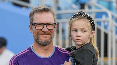 Coronation guest Dale Earnhardt Jr. with his daughter Isla Rose during pregame warm ups between the Charlotte FC and the Colorado Rapids at Bank of America Stadium.