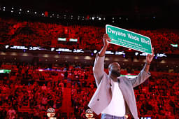 Former Miami Heat guard Dwyane Wade is honored with 'Dwayne Wade Blvd' at halftime during a game against the Detroit Pistons at Kaseya Center.