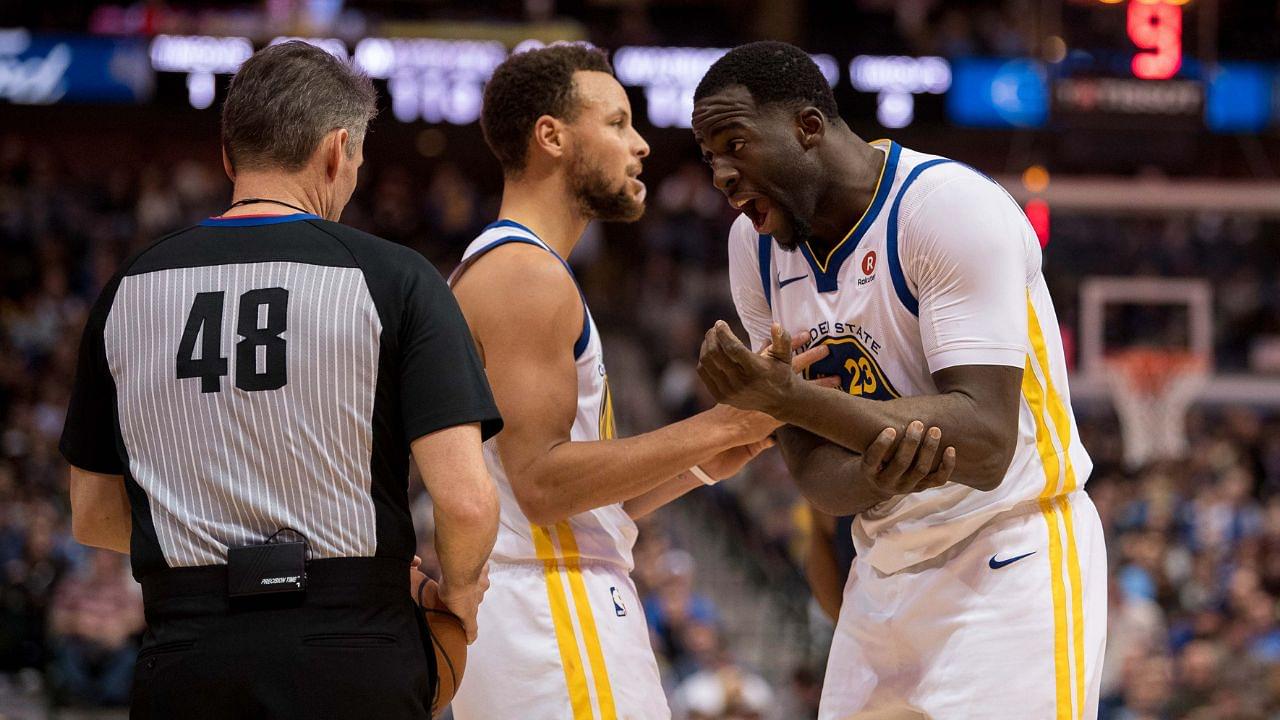 Golden State Warriors guard Stephen Curry (30) and forward Draymond Green (23) and referee Scott Foster (48) during the game against the Dallas Mavericks at the American Airlines Center. The Warriors defeat the Mavericks 125-122.