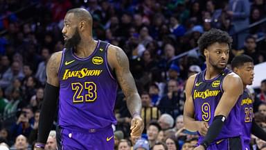 Los Angeles Lakers forward LeBron James (23) and guard Bronny James (9) look on during the third quarter against the Philadelphia 76ers at Wells Fargo Center.