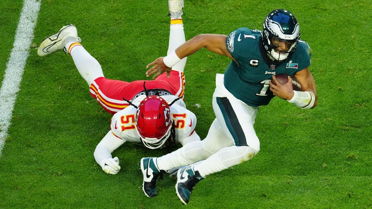 Eagles quarterback Jalen Hurts scrambles for extra yardage during the first half of Super Bowl 57 against the Chiefs on Feb. 12, 2023.