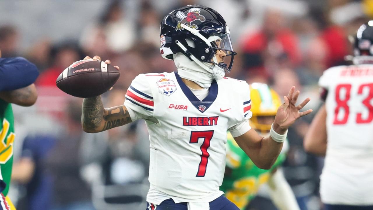 Jan 1, 2024; Glendale, AZ, USA; Liberty Flames quarterback Kaidon Salter (7) throws against the Oregon Ducks during the second half in the 2024 Fiesta Bowl at State Farm Stadium.