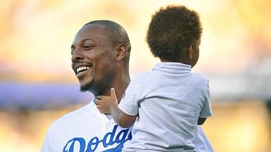 Los Angeles Clippers forward Paul Pierce in attendance with son Prince before the Los Angeles Dodgers play against the Oakland Athletics at Dodger Stadium