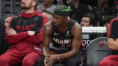 Miami Heat forward Jimmy Butler (22) looks on from the bench during the second half at Kaseya Center.