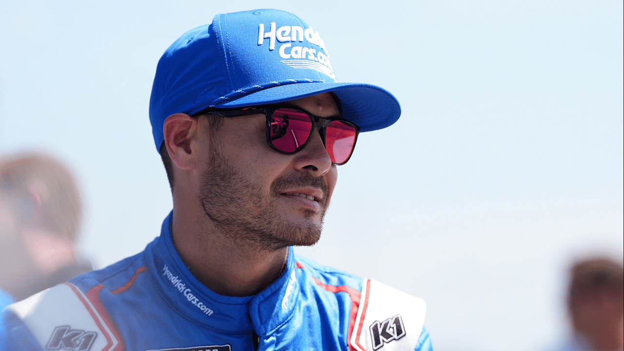 Aug 31, 2024; Darlington, South Carolina, USA; NASCAR Cup Series driver Kyle Larson (5) sits by his car prior to practice during practice for the Cook Out Southern 500 at Darlington Raceway. Mandatory Credit: Jasen Vinlove-Imagn Images