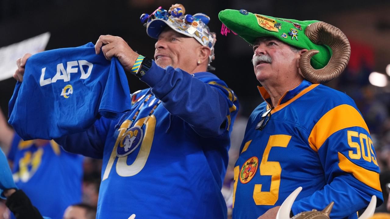 Jan 13, 2025; Glendale, AZ, USA; Los Angeles Rams fans react against the Minnesota Vikings during the first half in an NFC wild card game at State Farm Stadium.