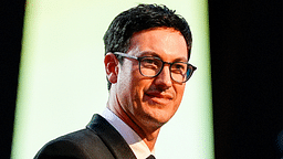 Nov 22, 2024; Charlotte, NC, USA; NASCAR Cup Series driver Joey Logano (22) talks to the audience after being announced as the three time Cup champion during the NASCAR Awards Banquet at Charlotte Convention Center. Mandatory Credit: Jim Dedmon-Imagn Images