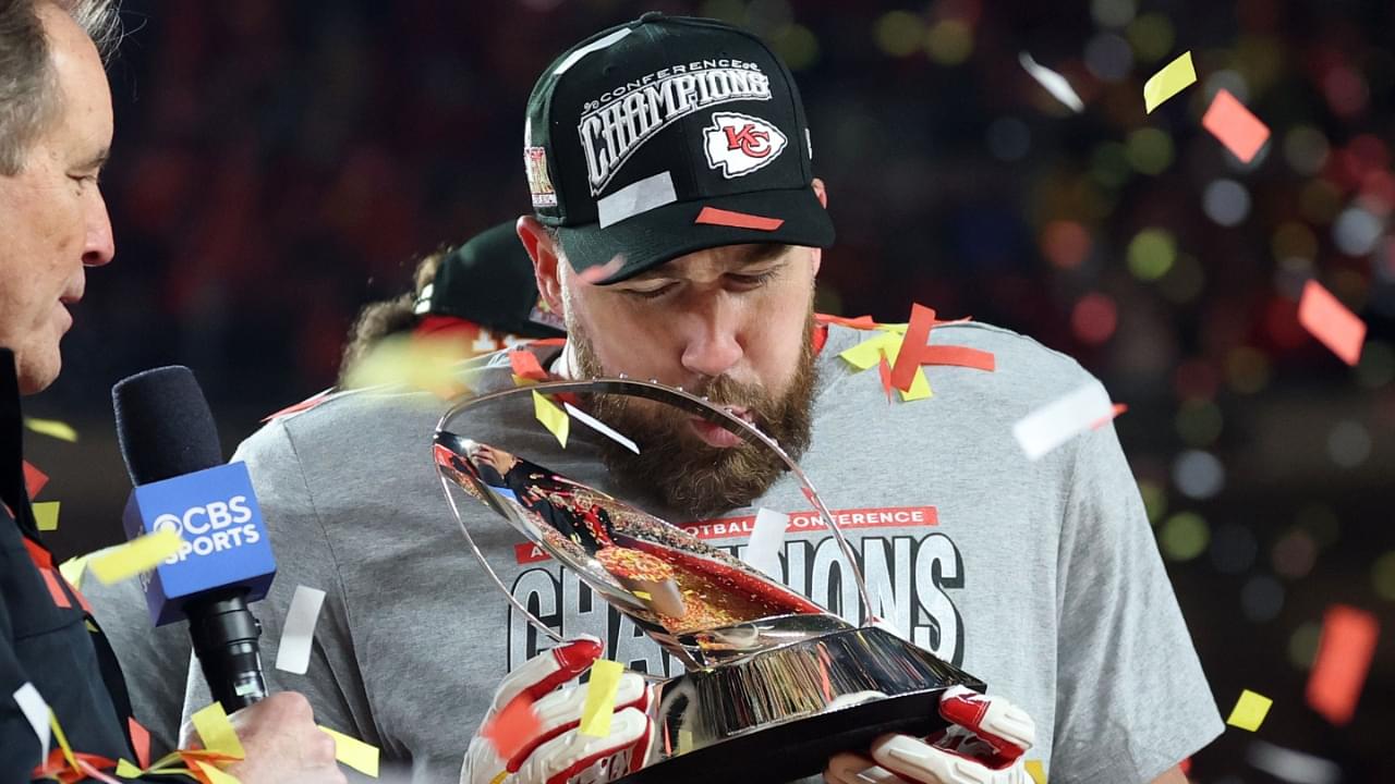 Jan 26, 2025; Kansas City, MO, USA; Kansas City Chiefs tight end Travis Kelce (87) reacts on stage after the AFC Championship game against the Buffalo Bills at GEHA Field at Arrowhead Stadium.