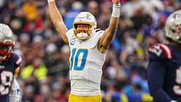 Dec 28, 2024; Foxborough, Massachusetts, USA; Los Angeles Chargers quarterback Justin Herbert (10) reacts after his touchdown pass against the New England Patriots in the third quarter at Gillette Stadium.